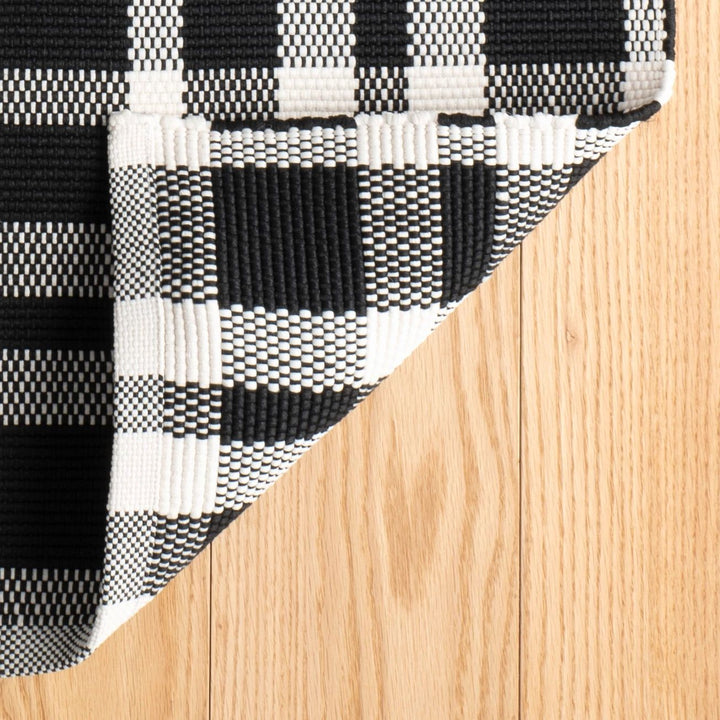 Tattersall Black Handwoven Indoor/Outdoor Rug Rug By Annie Selke